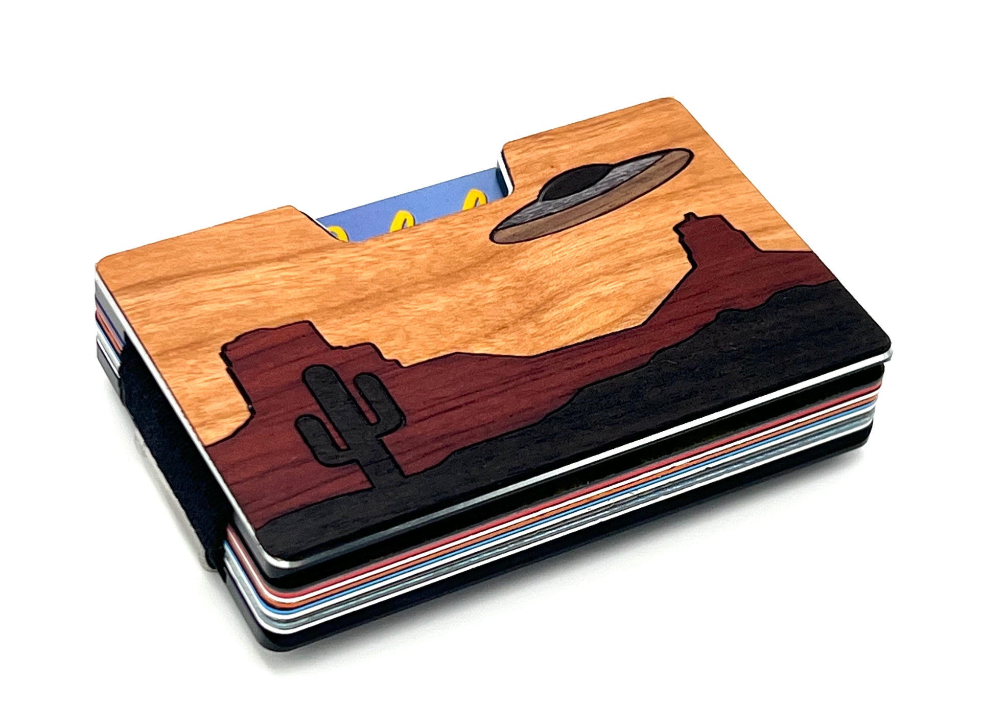 Angled view of the desert mesa and flying saucer wood inlay wallet