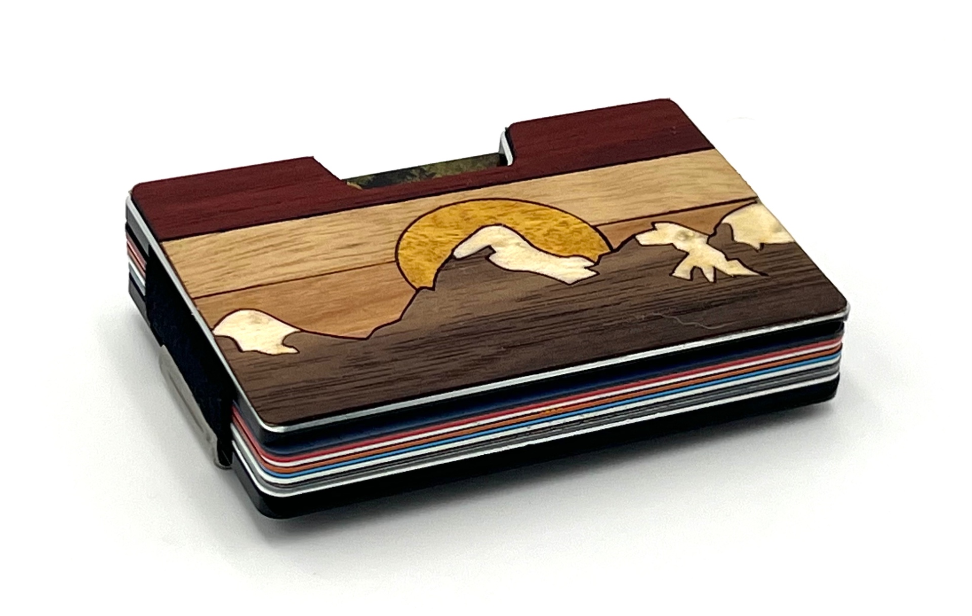 Angled view of the sun and snow-capped peaks wood inlay wallet