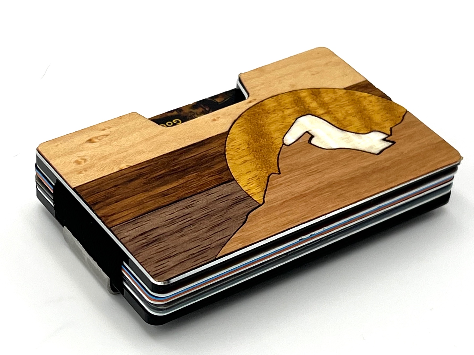 Angled view of the golden sun peak wood inlay wallet