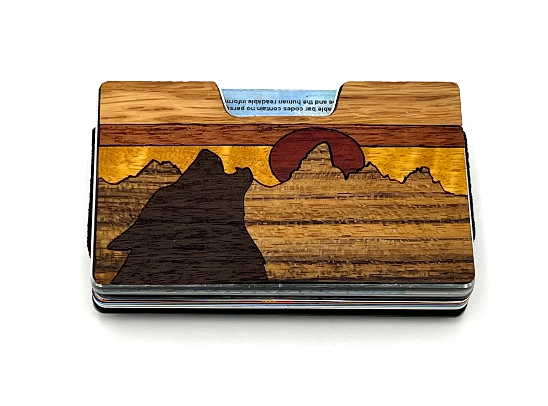 Wood inlay wallet with dark mountain peaks and a red sun