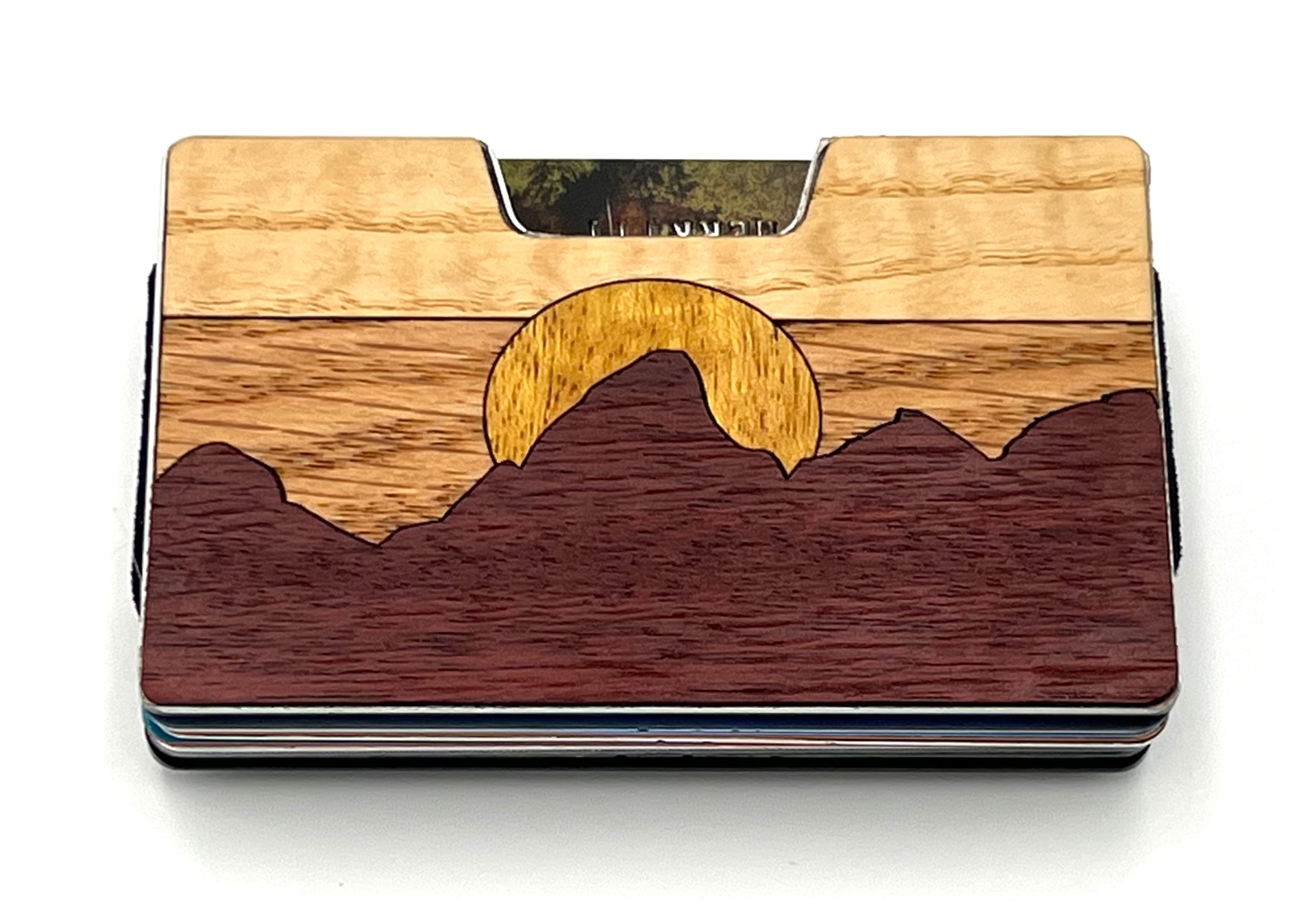 Sunrise over a red mountain ridge wood inlay wallet